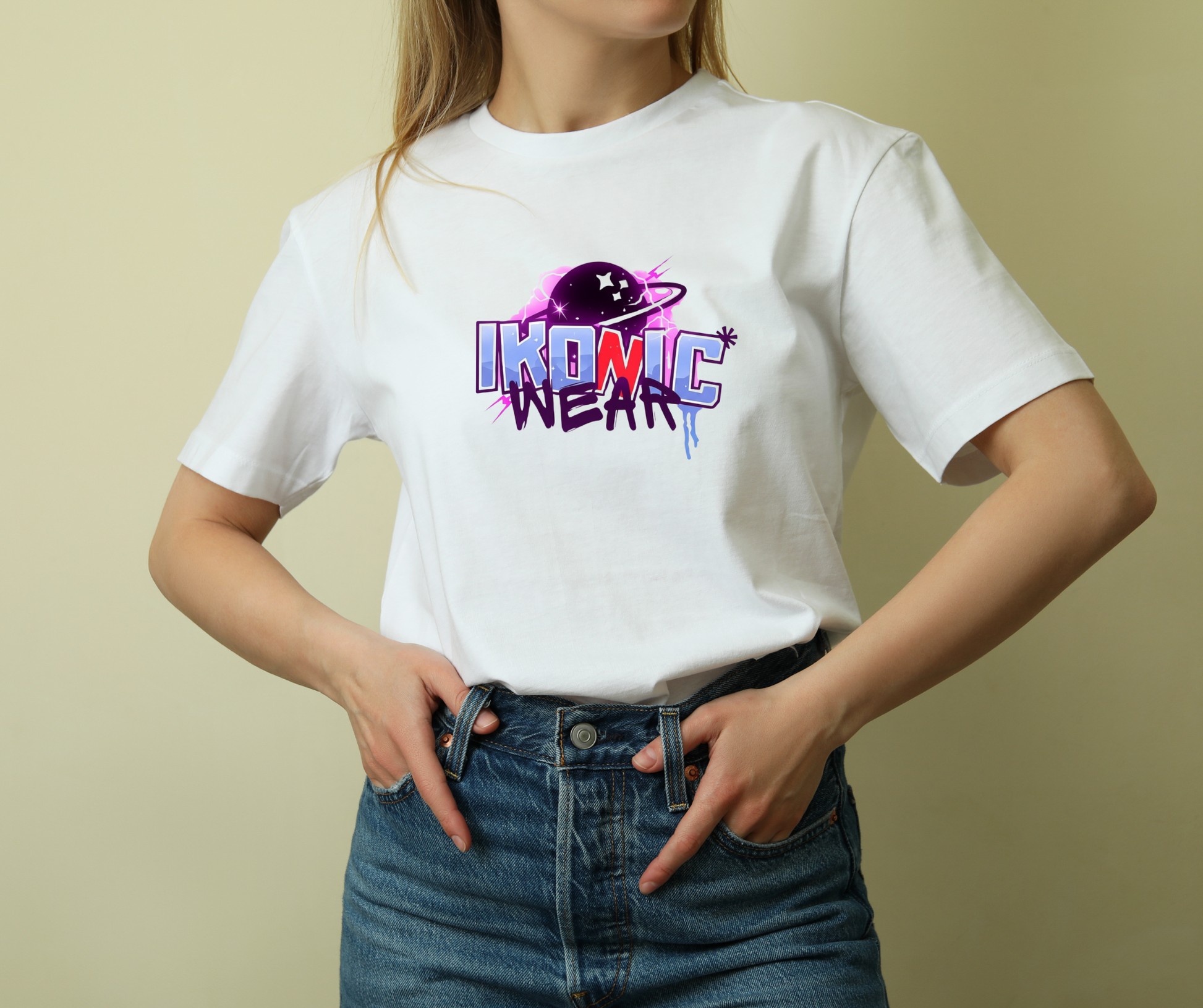 Person wearing a white t-shirt with 'IKONIC WEAR' logo on a beige background